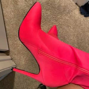 Anne Michelle neon pink sock boots.